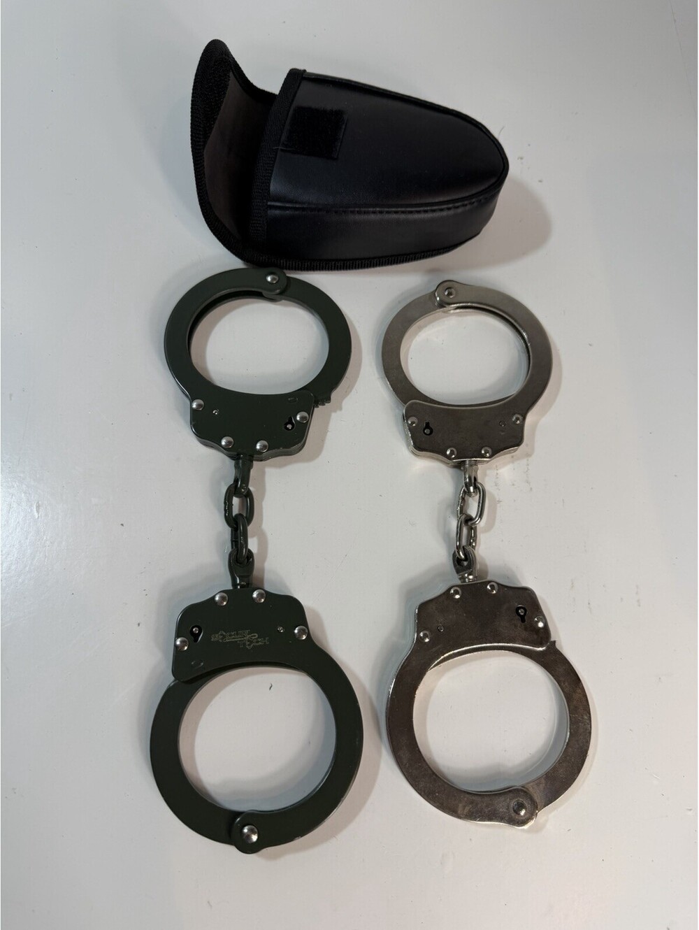 2 Pairs of Handcuffs (SecuriTech + Unbranded) + Belt Holster | No Keys